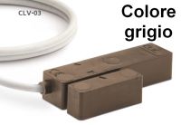 Marchio: TSEC. Articolo: CLV-03-G. Sensore inerziale CLIC serie V a vista con contatto magnetico integrato, resinatura completa, cavetto 2 metri, grigio (G). Disponibile marrone (N) o bianco (W) su ordinazione.